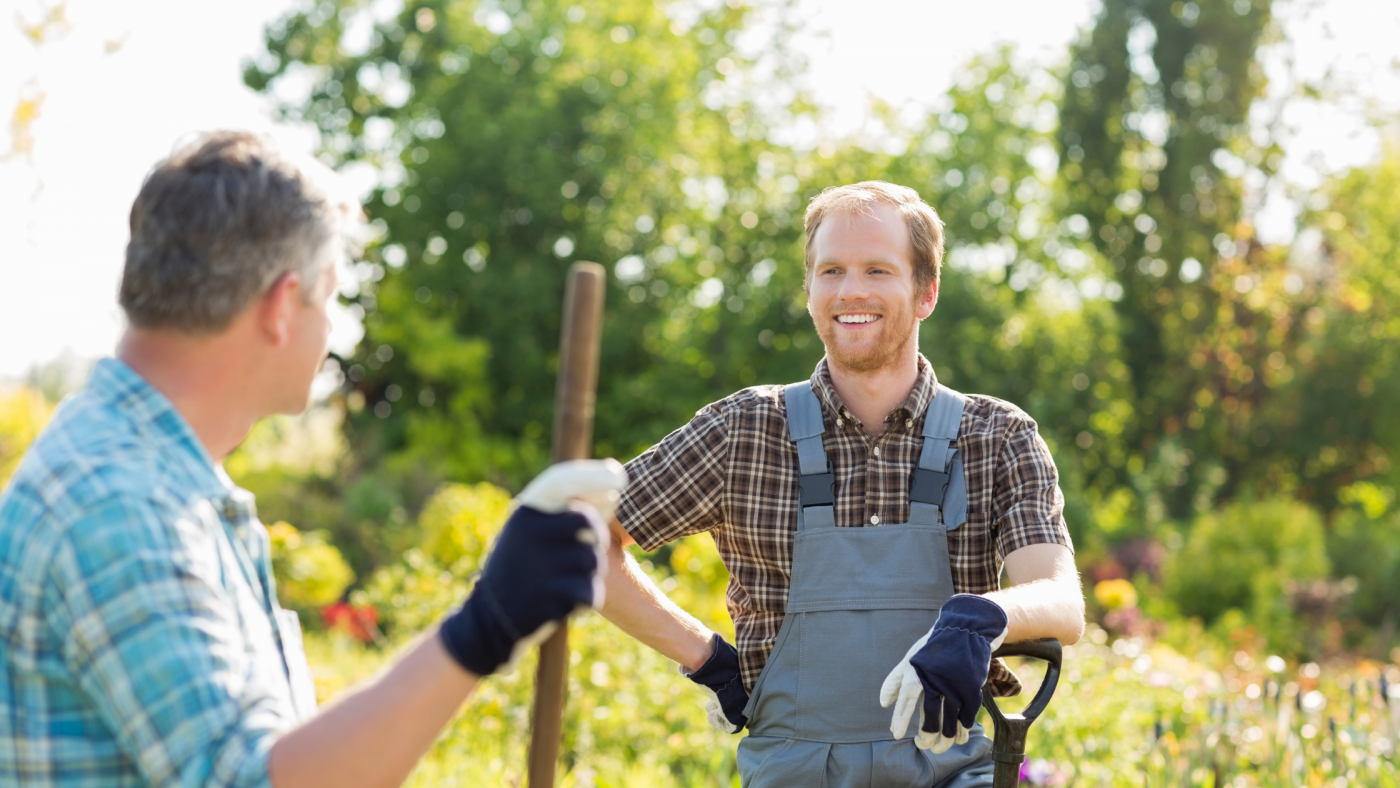 Foreign worker maintaining greenhouse plants in Russia under 2025 gardener visa program